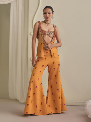 Mustard embellished bustier, bell-bottom pants and koti