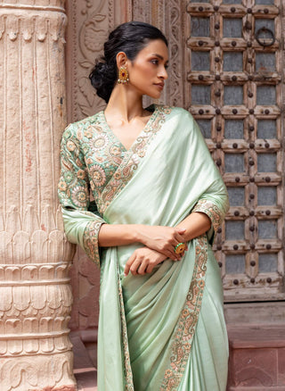 Mint green paisley embroidered sari and blouse