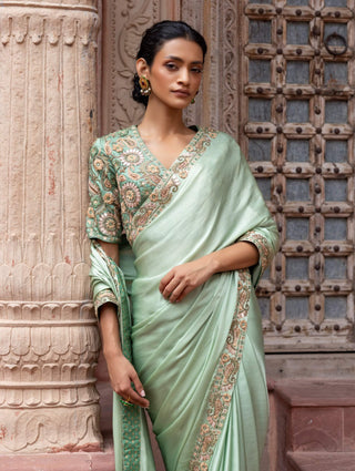 Mint green paisley embroidered sari and blouse