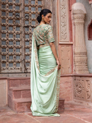 Mint green paisley embroidered sari and blouse