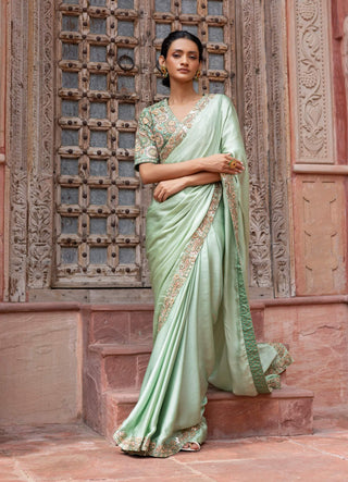 Mint green paisley embroidered sari and blouse