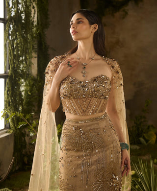 Lustre gold lehenga and cape set