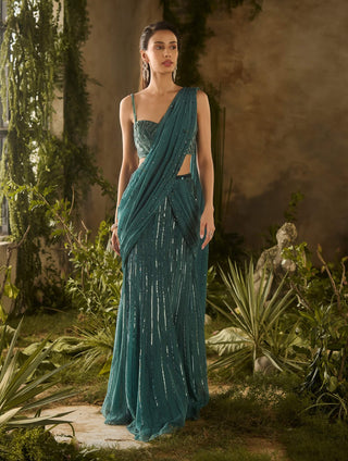 Opulent olive green draped sari and blouse