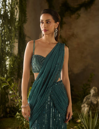 Opulent olive green draped sari and blouse