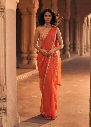 Burnt orange pre-draped sari and corset blouse