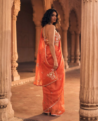 Burnt orange pre-draped sari and corset blouse