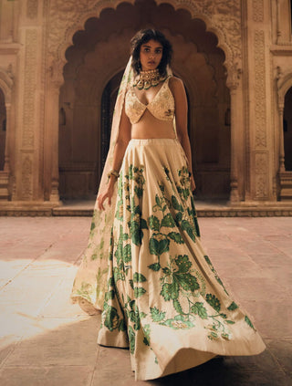 Ivory And Green Floral Lehenga Set by Paulmi & Harsh available on Indiaspopup.com