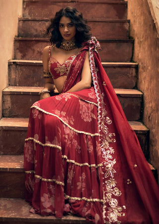 Deep red chiffon pre–draped sari and blouse