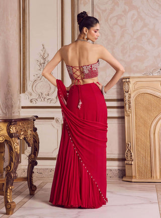 Magenta draped chiffon sari and corset