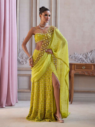 Neon green draped slit sari and bustier