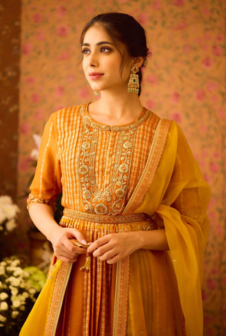 Amber Glow Yellow Mustard Kurta And Flared Pant Set by Shyam Narayan Prasad available on Indiaspopup.com