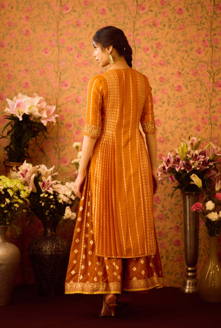 Amber Glow Yellow Mustard Kurta And Flared Pant Set by Shyam Narayan Prasad available on Indiaspopup.com