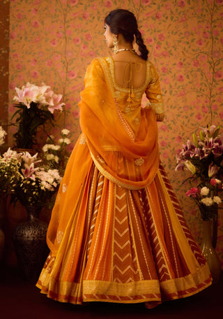 Yam Golden Yellow Mustard Lehenga Set by Shyam Narayan Prasad available on Indiaspopup.com