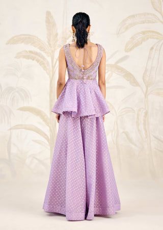 Three-quarter angle highlighting fitted top silhouette and flare