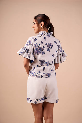 Blue-white ruffle shirt and shorts