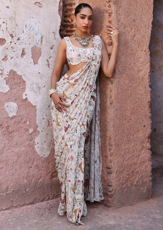 Tanishka ivory printed sari and blouse