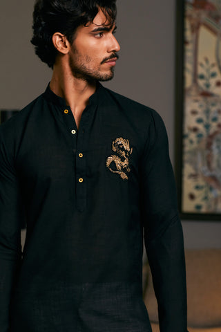 Black Asymmetric Drape Kurta by Siddartha Tytler Men, available on Indiaspopup.com