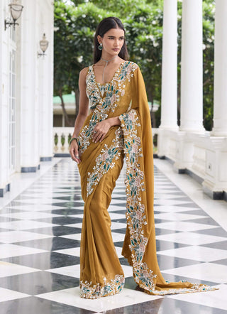 Niharika brass gold embellished sari with blouse