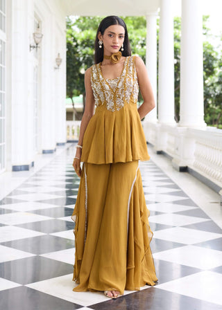 Supriya brass gold peplum gharara set