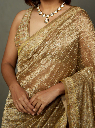 Gold Rohira Saree With Unstitched Blouse by Ri.Ritu Kumar, available on Indiaspopup.com