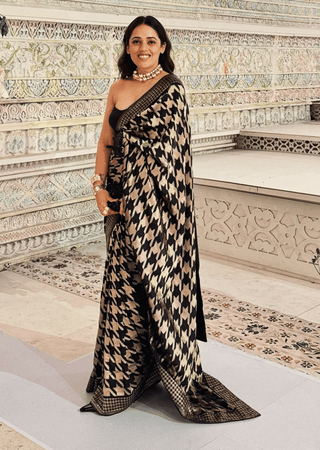 Black and gold gerum sari with unstitched blouse piece