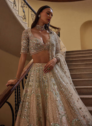 Ivory Multi Embroidered Lehenga Set by Tamanna Punjabi Kapoor available on Indiaspopup.com