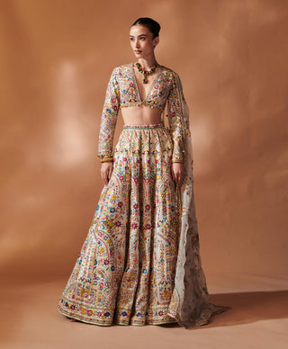 Ivory Full Sleeved Lehenga Set by Tamanna Punjabi Kapoor, available on Indiaspopup.com