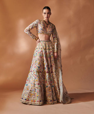 Ivory Full Sleeved Lehenga Set by Tamanna Punjabi Kapoor, available on Indiaspopup.com