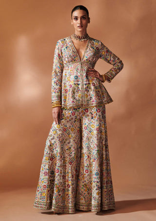 Ivory Embroidered Peplum Sharara Set by Tamanna Punjabi Kapoor, available on Indiaspopup.com