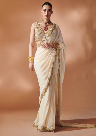 Ivory and gold stitched sari and blouse