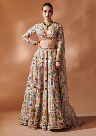 Ivory Full Sleeved Lehenga Set by Tamanna Punjabi Kapoor, available on Indiaspopup.com