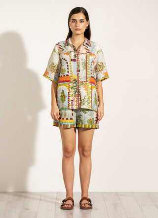 Sable green button-down shirt and shorts