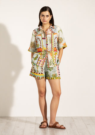 Sable green button-down shirt and shorts