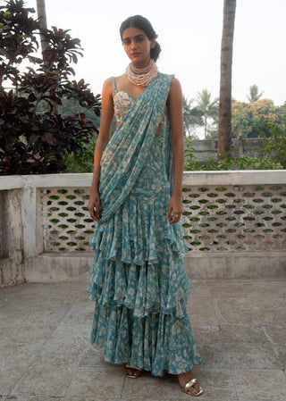 Ice blue floral printed draped sari and blouse