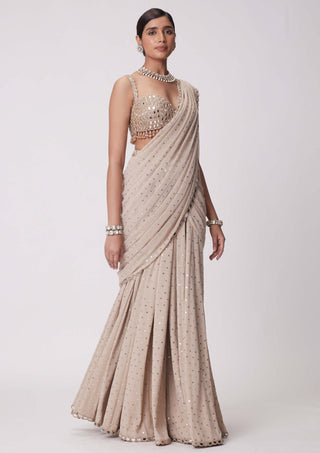Light beige pre-draped sari and blouse