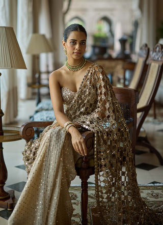 Light beige cutwork pallu sari corset set