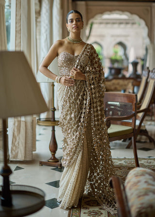 Light beige cutwork pallu sari corset set