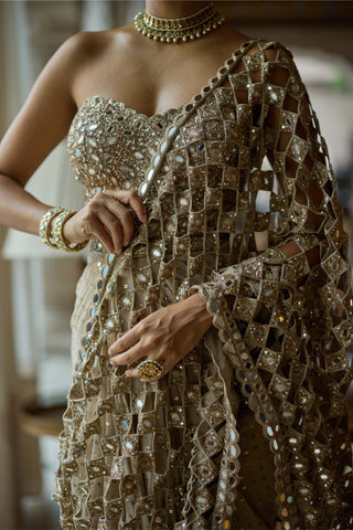 Light beige cutwork pallu sari corset set