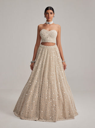 Light beige dense mirror and pearl corset lehenga set