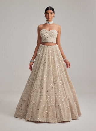 Light beige dense mirror and pearl corset lehenga set