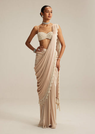 Light beige draped sari and blouse