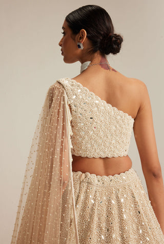 Light beige dense mirror and pearl one shoulder lehenga set