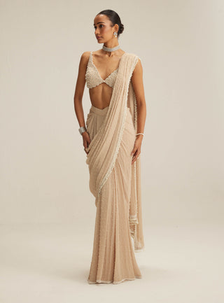 Light beige draped sari and blouse