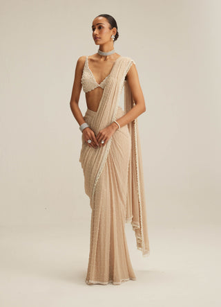 Light beige draped sari and blouse