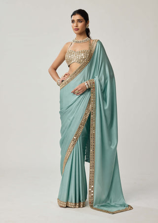 Powder blue satin sari and halter blouse