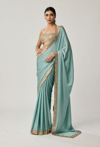 Powder blue satin sari and halter blouse