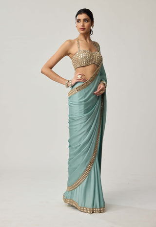 Powder blue satin sari and halter blouse