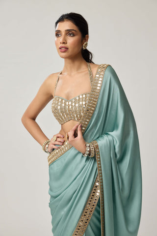 Powder blue satin sari and halter blouse