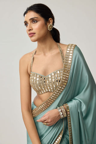 Powder blue satin sari and halter blouse