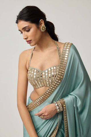 Powder blue satin sari and halter blouse